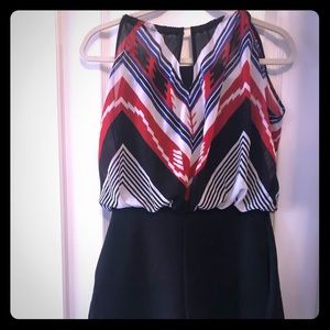 Romper with connected sheer top.